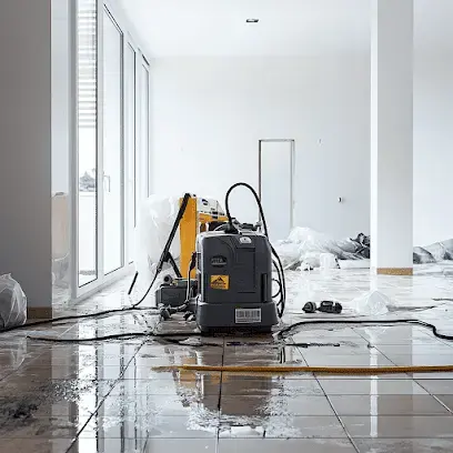 Extraction unit on a wet tile floor during water removal