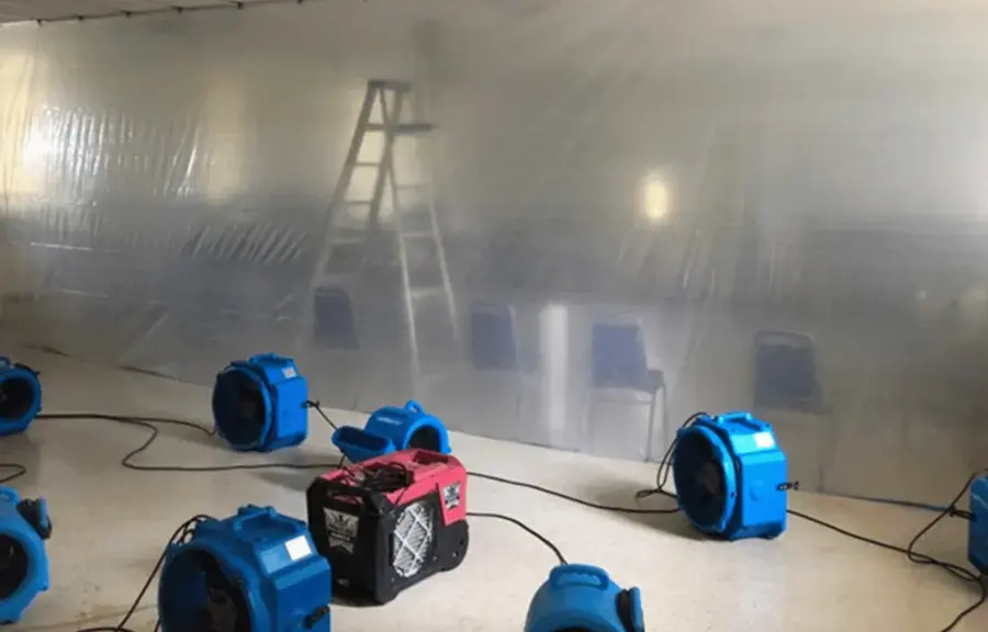 Drying equipment running in a Cedar Park commercial space after a water loss