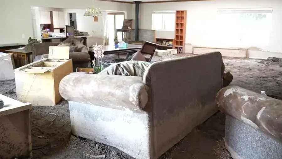Floodwater standing inside a Cedar Park home after a Brushy Creek storm